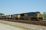 CSX 5221 leads train Q410 northbound, out of the yard